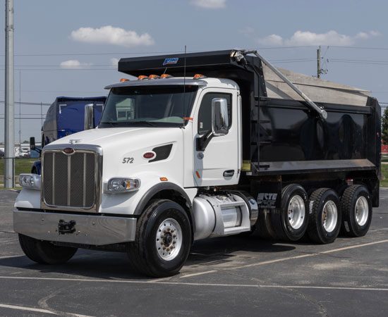 dump truck sitting in a parking lot